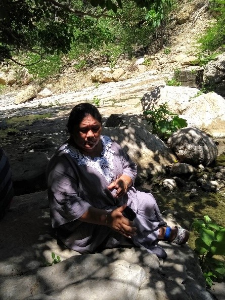 The coal mine diverted the Aguas Blancas stream, causing it to dry up. According to Yaneth Ortiz, this process affected the Wayuu body-territory-water relationship. Source: Astrid Ulloa, July 2019.]